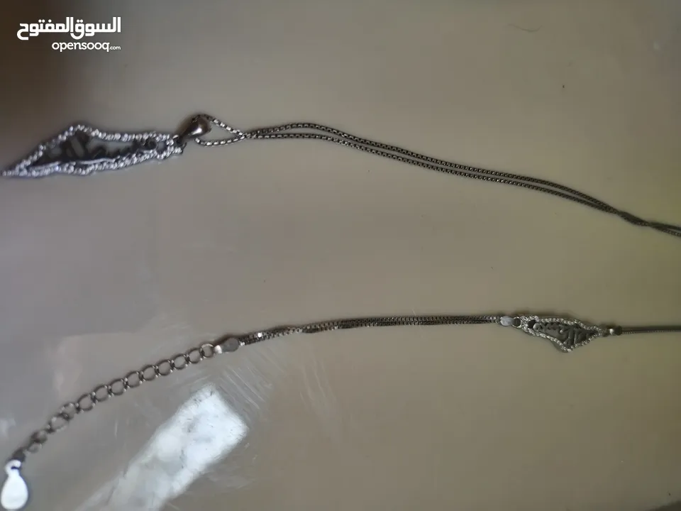 سنسال وسوارة فضة