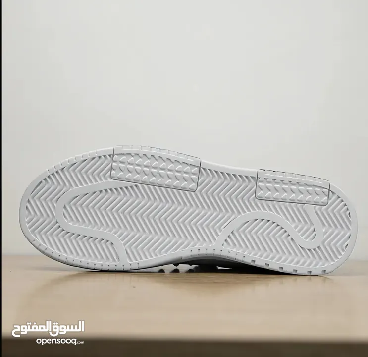 Black and white designer shoes size: 42 negotiable price FREE DELIVERY