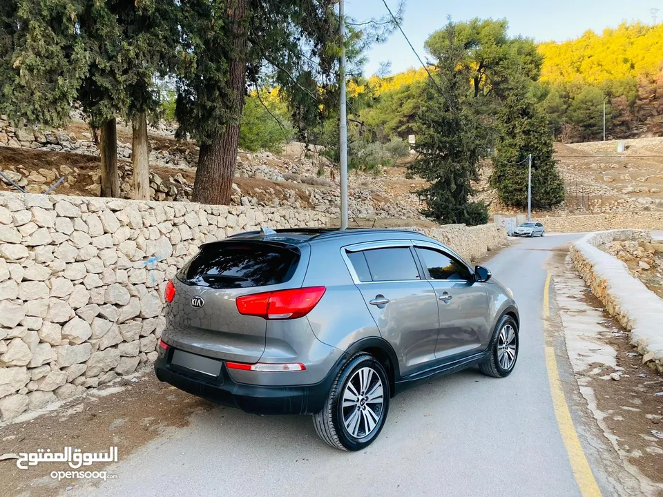 كيا سبورتاج فل الفل مع فتحة بسعر حرق 2015 رخصة