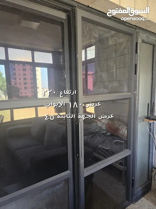 باب المنيوم دفتين