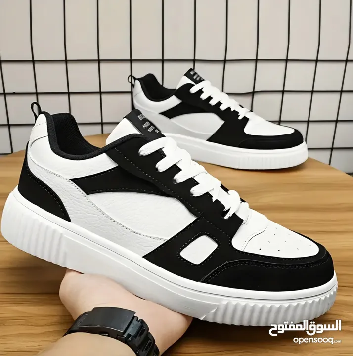 Black and white designer shoes size: 42 negotiable price FREE DELIVERY