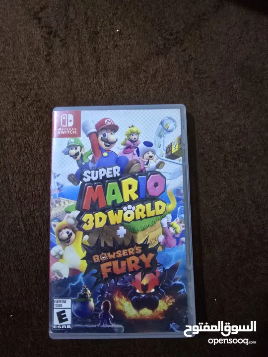 نينتندو سويتش مع 5 العاب super mario party و super mario wonder و super mario 3d world و ايد وكنترول
