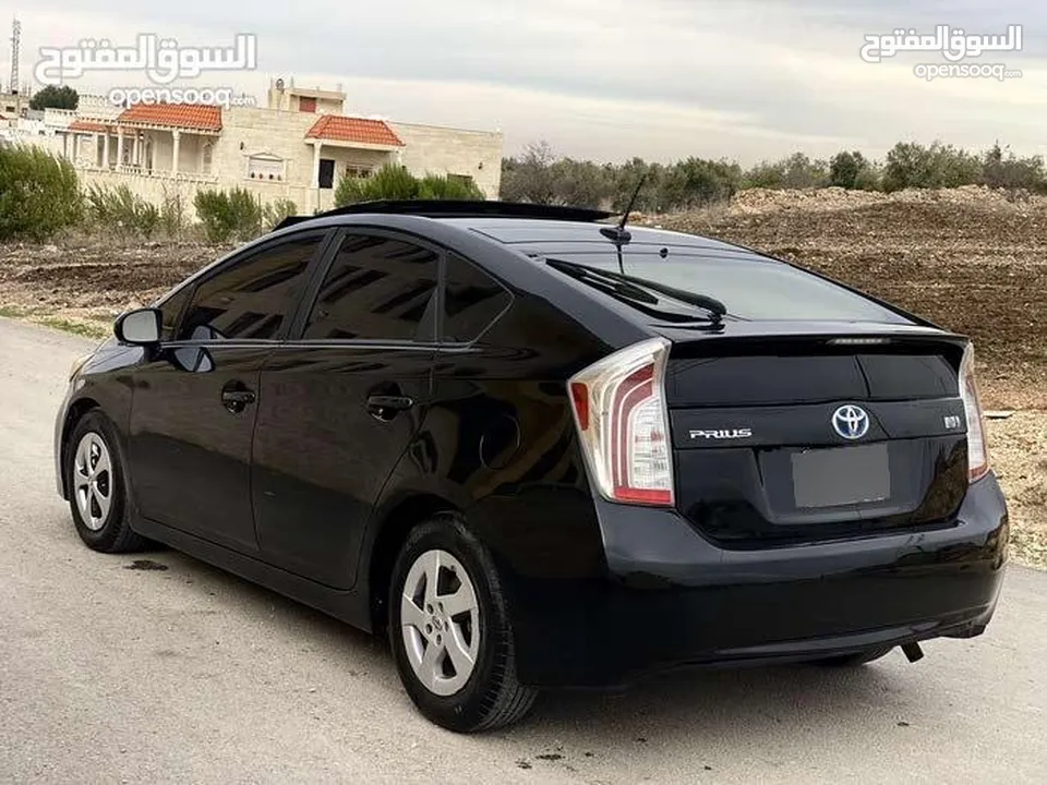 تويوتا بريوس 2015 هايبرد فل كامل مع بانوراما أعلى صنف بكج ( 5) لون اسود مميز