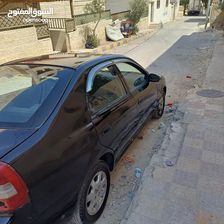 كيا شوما 1999