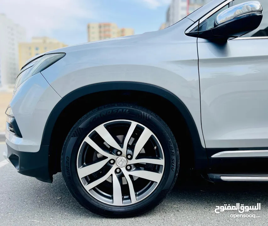 A Clean And Well Maintained HONDA PILOT 2016 SILVER GCC TOURING AWD