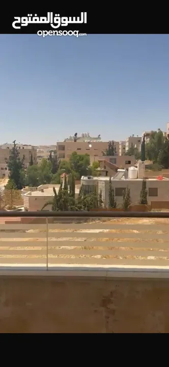 Excellent natural light and winds with views of Shafa Badran from the highest level in the building.