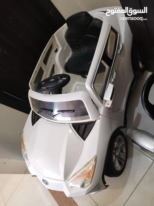 سيارة اطفال كهربائية ودراجه مستعمل للبيع