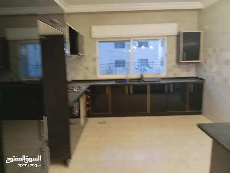 شقه للايجار ارضي في الشميساني