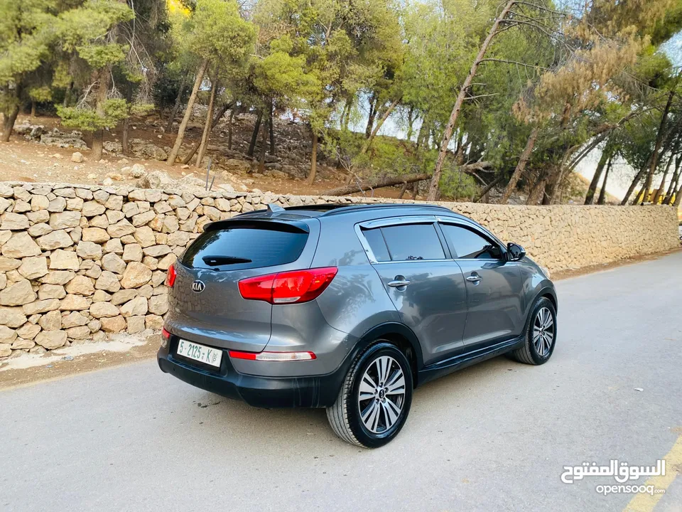 كيا سبورتاج فل الفل مع فتحة بسعر حرق 2015 رخصة