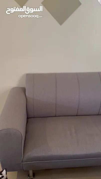 كنبة شكل ل - Grey L-shape Sofa