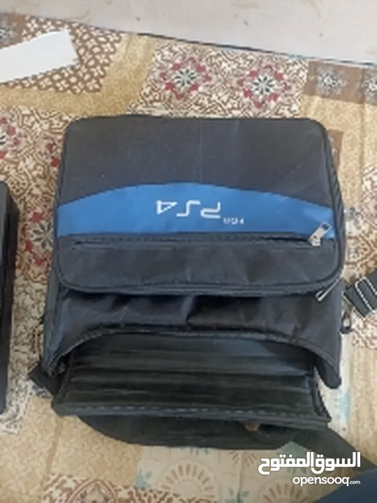 ps4 with 2 controllers and 4 games