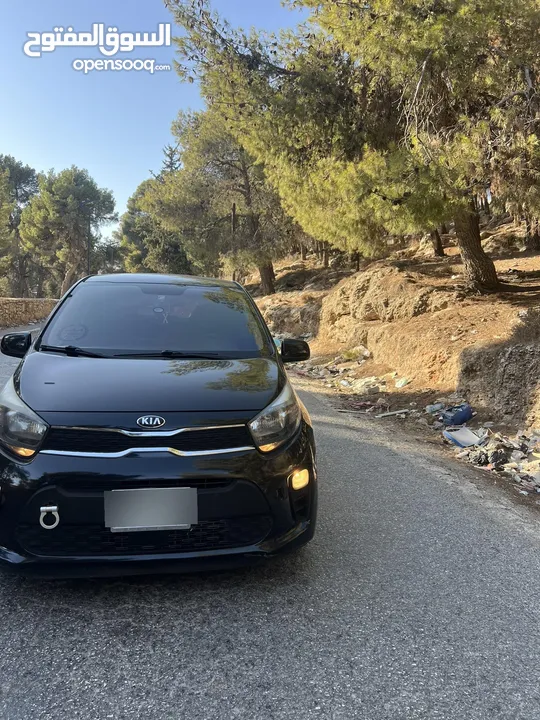 سيارة للبيع كيا مورننغ باللون الاسود المميز ،،،، سعر مغري ع الكاش