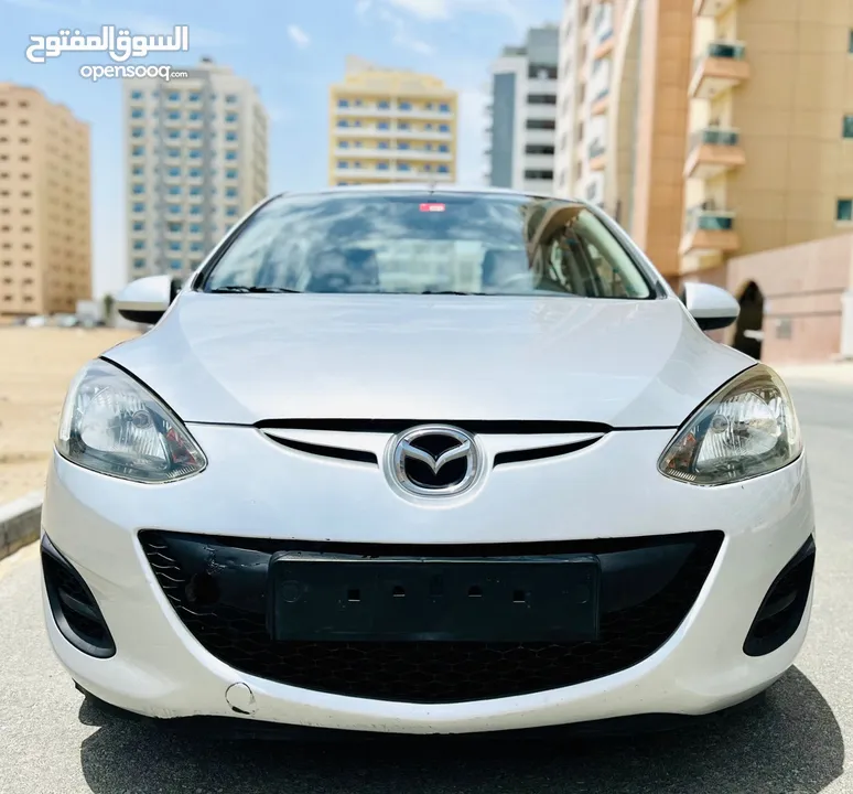 MAZDA 2 2015 MODEL SILVER GCC SPECS LESS KM REF.2683