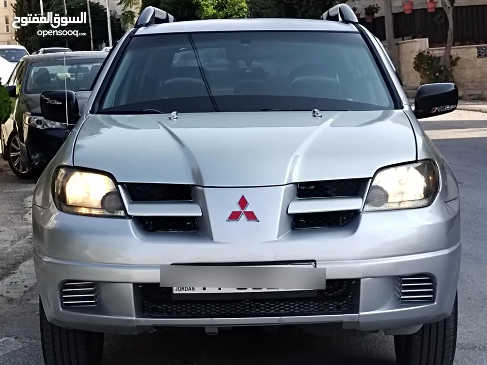ميتسوبيشي آوتلاندر اوتوماتيك 2003 توب نظافة بسعرررر مميززز محرك 2400cc