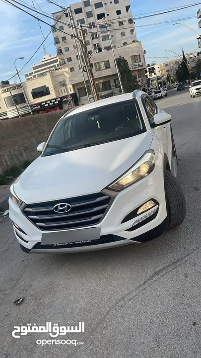 جيب توسان 2018 أبيض  متور 2000 فحص نخب  ديزل  اوتوماتيك