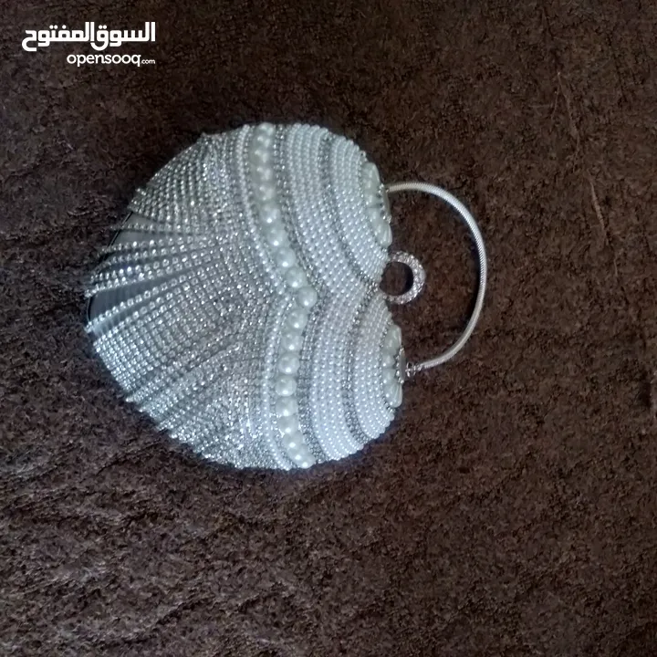 شنطه عروس فضيه مستعملة