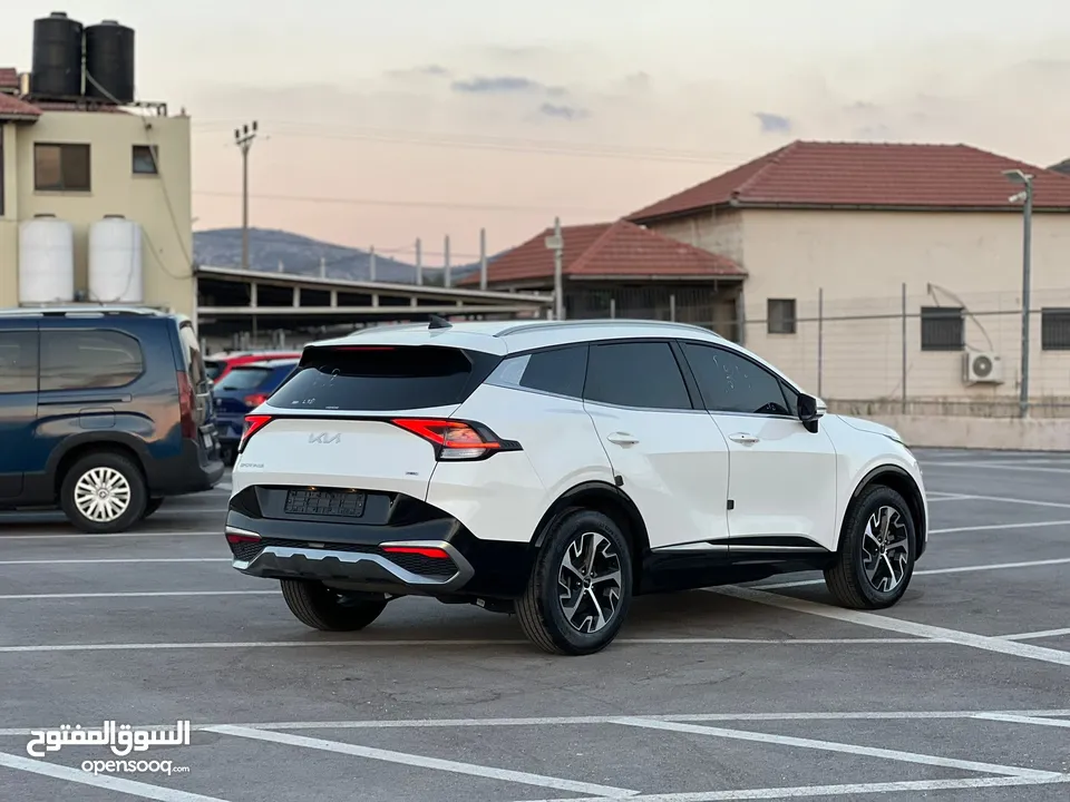 كايا سبورتاج /2022 فل بدون فتحة سقف  2x4 ///240Hp بنزين + كهرباء  ( Haybrid) 1600cc
