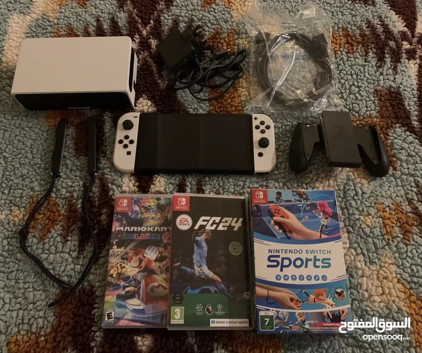 نينتيندو سويش oled مع العاب و جميع ملحقاتها  Nintendo switch oled with games and all accessories