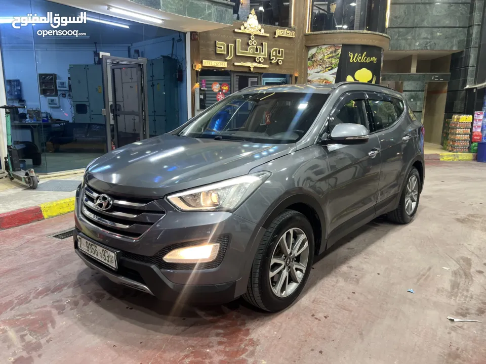 هونداي سنتافيه 2015 مطور 2000 ديزل اتوماتيك فل الفل بدون فتحه بسعررررر 66000 الف بسعرررر حرررق