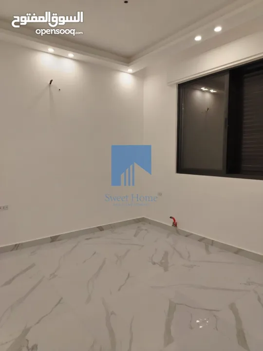 شقة أرضية فاخرة للبيع في خلدا - قرب إشارة البنك العربي 145م مع حديقة وترسات 120م لم تسكن