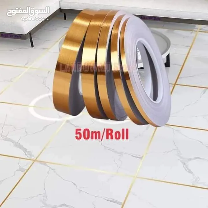 رول لاصق ذهبي او فضي ديكوري للارضيات و الحائط و الجدران ديكور شريط  لاصق منه وفيه للديكور طول 50 متر