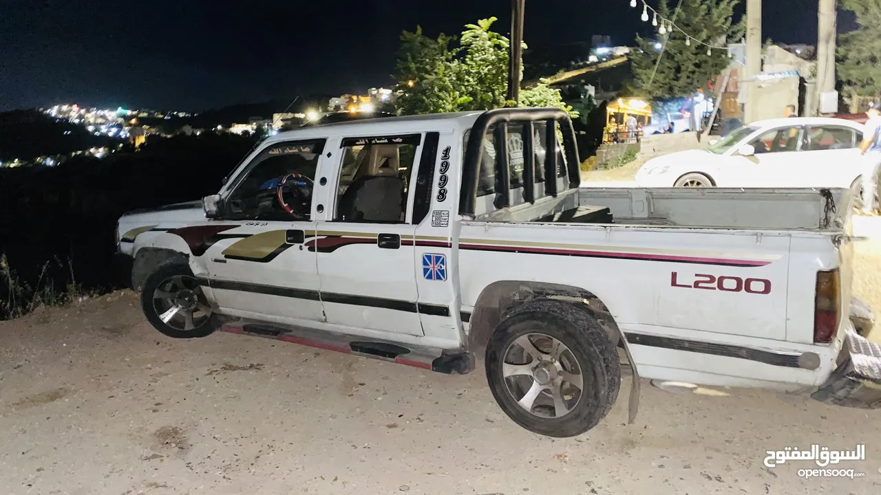 مستبيشي 1998 L200 لون ابيض للبيع اقساط دفعه 1000بحاجت ترخيص منتهي 6اشهر للستفسار
