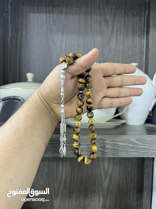 عرض خاص سبحه عين النمر ازرق او ذهبي بسعر حرق 33 حبة حلوة مش صغيرة للعلم مع طقم انتيومون مرتب