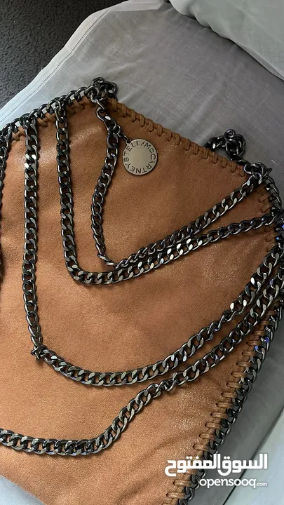 Stylish brown bag with dark silver details