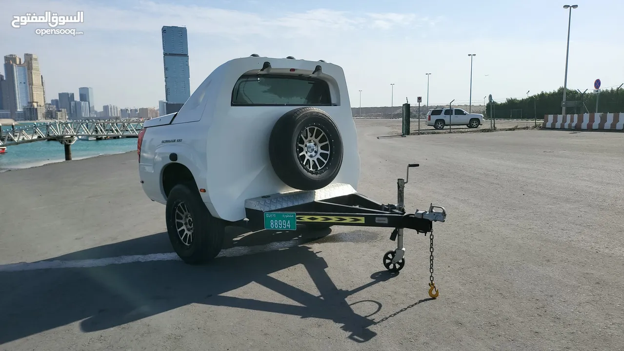 مقطورة للرحلات قابلة للتعديل. Adjustable travel cadillac trailer