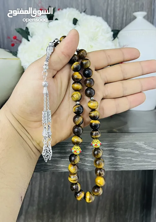 عرض خاص سبحه عين النمر ازرق او ذهبي بسعر حرق 33 حبة حلوة مش صغيرة للعلم مع طقم انتيومون مرتب