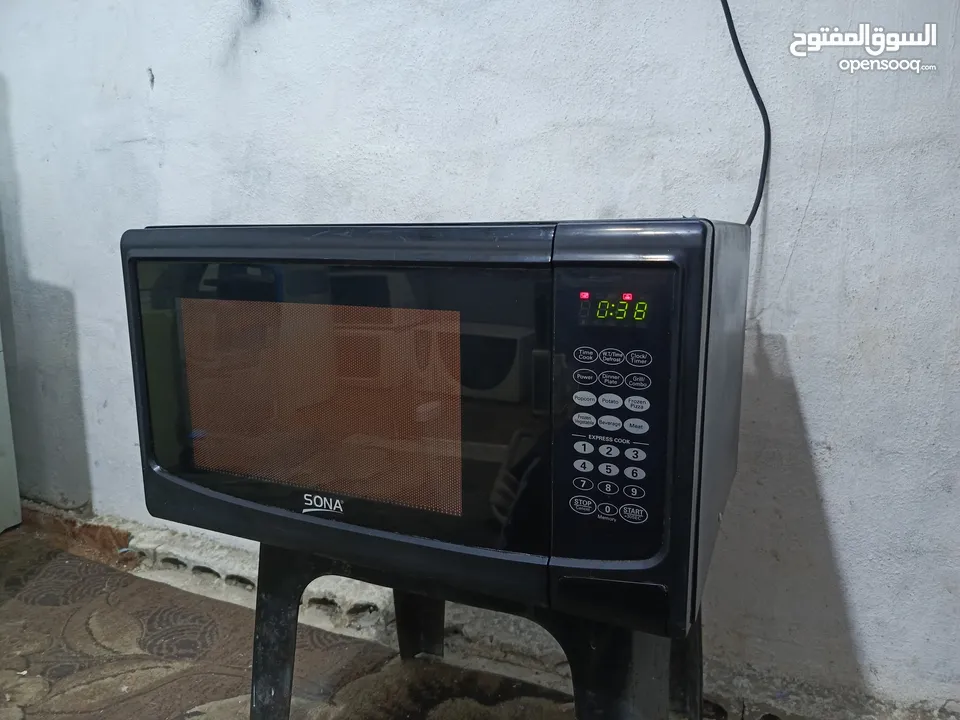 ميكرويف سونا 45لتر لون اسود مع نظام شواي داخليه بحال الوكاله قابل للتفاوض يوجد توصيل