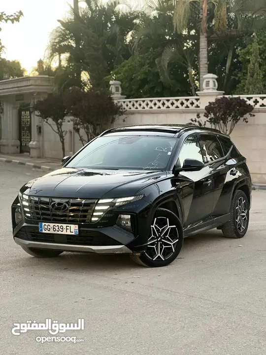 توسان هايبرد ( hybrid plug-in N-Line ) اوتوماتيك فل مواصفات بانوراما 4*4 بمشي 65 ك عالشحنه