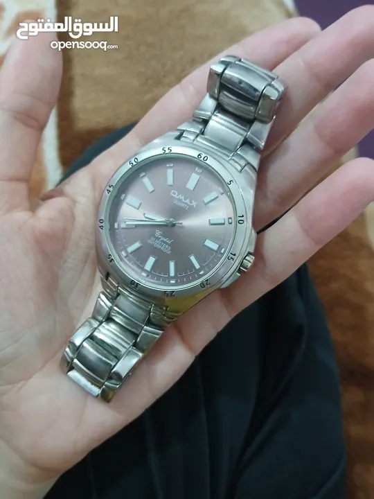 ساعة  OMAX QUARTZ الرجالية للبيع  17د الأصلية  WATERPROOF