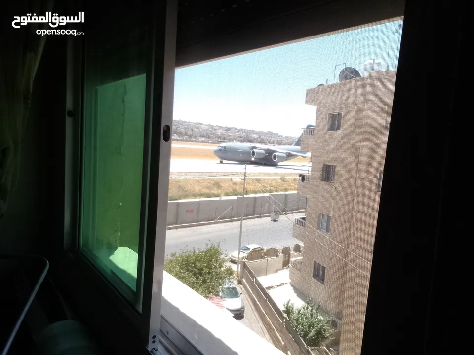 شقه للبيع حي العبدلات مطله ع شارع شيك