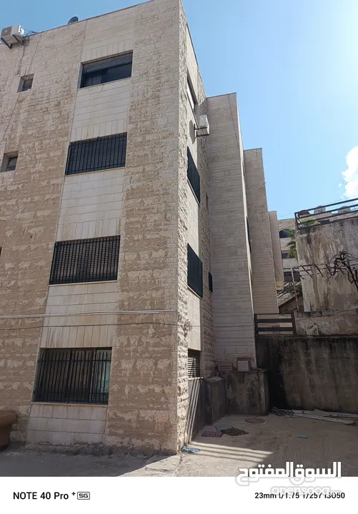 عمارة للبيع تلاع العلي خلف مطعم جبري شارع الجاردنز منطقة جميلة و هادئة