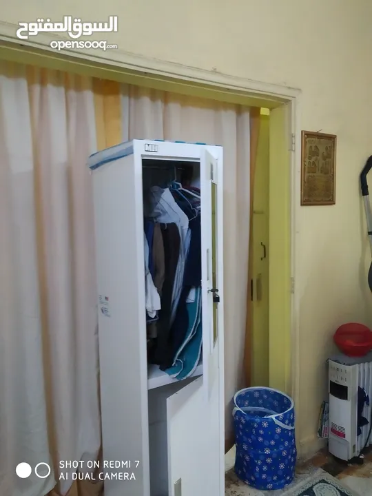 WHITE FOLDABLE CUPBOARD. Light in weight . easily moveable.