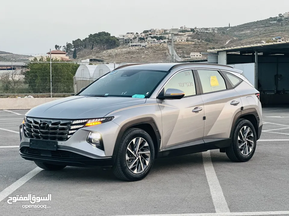 هونداي توسان 2022 فل بدون فتحة سقف  2x4 ///240Hp بنزين + كهرباء  ( Haybrid) 1600cc