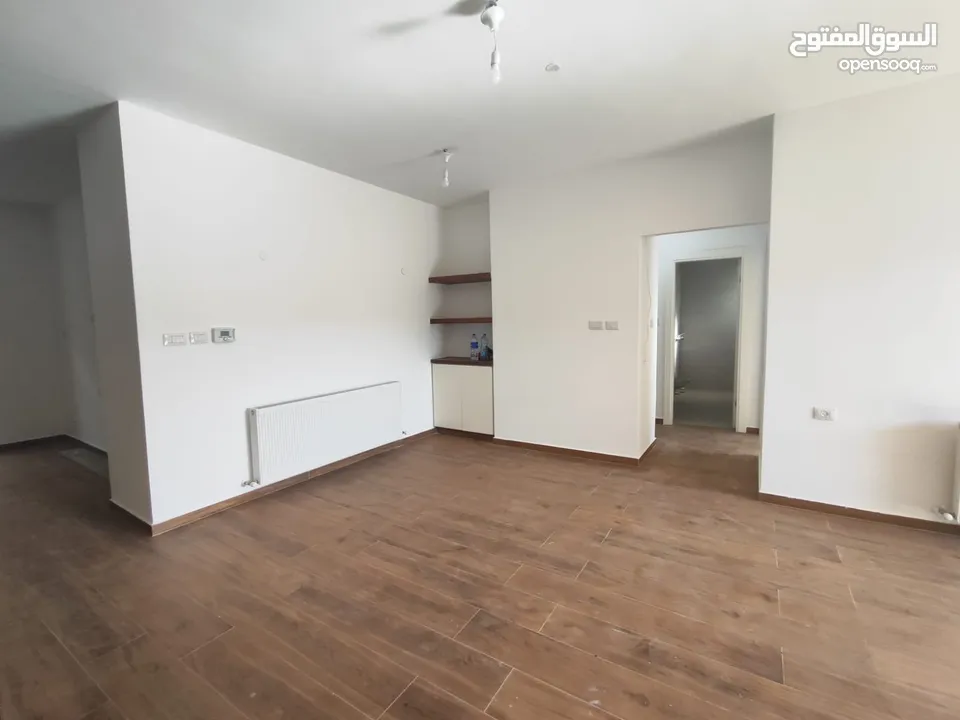 شقة مميزة قيد الفرش للإيجار – عين منجد  شارع إسكان المهندسين