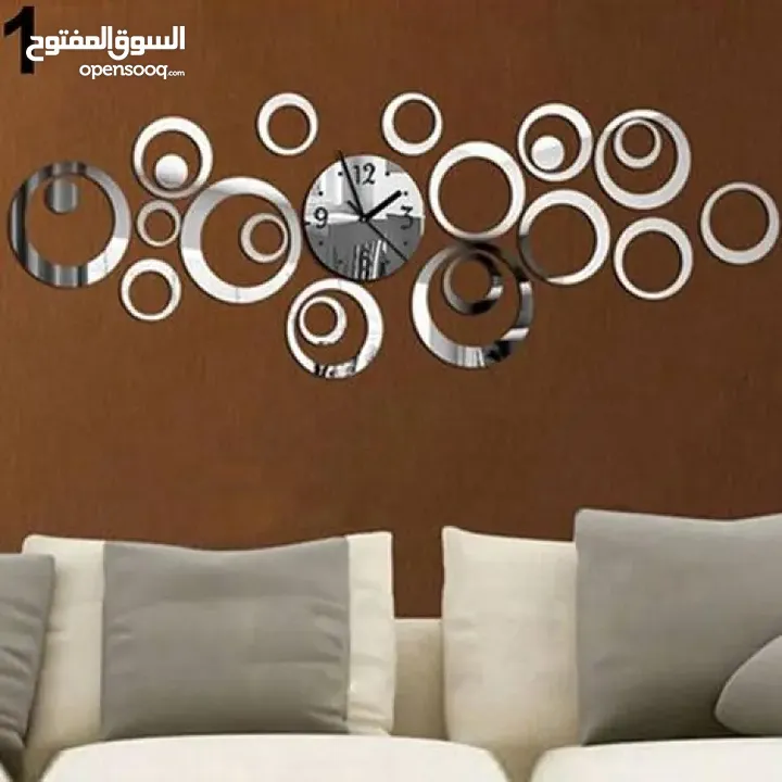 ساعه  حائط  ضخمه ديكور  ساعة  لون ذهبي و اسود و فضي مرآه و بني  حجمين
