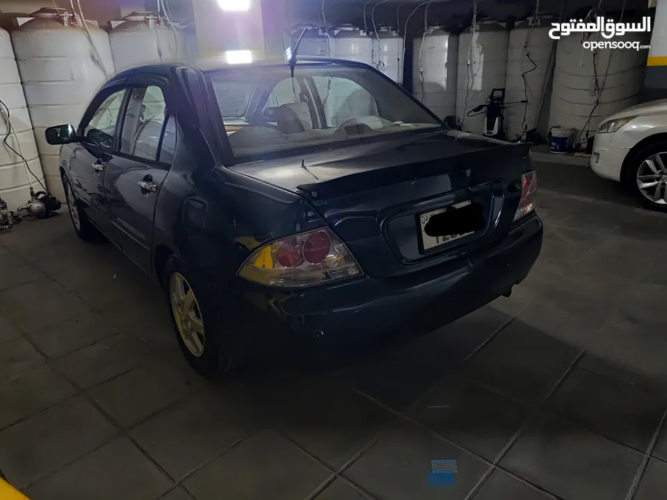 متسوبيشي لانسر GLX 2007 1600 cc وارد الخليج الكويت جميع الإضافات بإستثناء الفتحه وجنط إضافي.