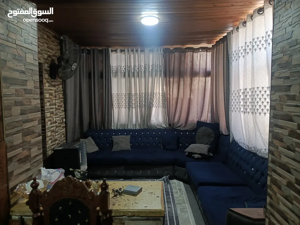 شقه ارضيه للبيع كاش او اقساط عن طريق البنك العربي الإسلامي الدولي في عمان حي نزال على الشارع الرئيسي