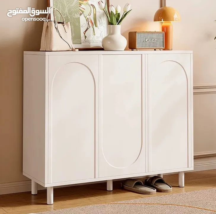 خزانة احذية حليب مزخرفة بشكل اقواس