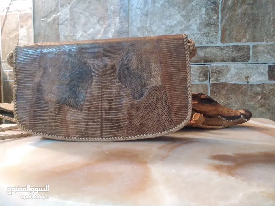شنط نسائية من جلد التمساح و الثعبان