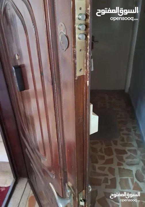 ,باب حديد حمايه وباب خشب