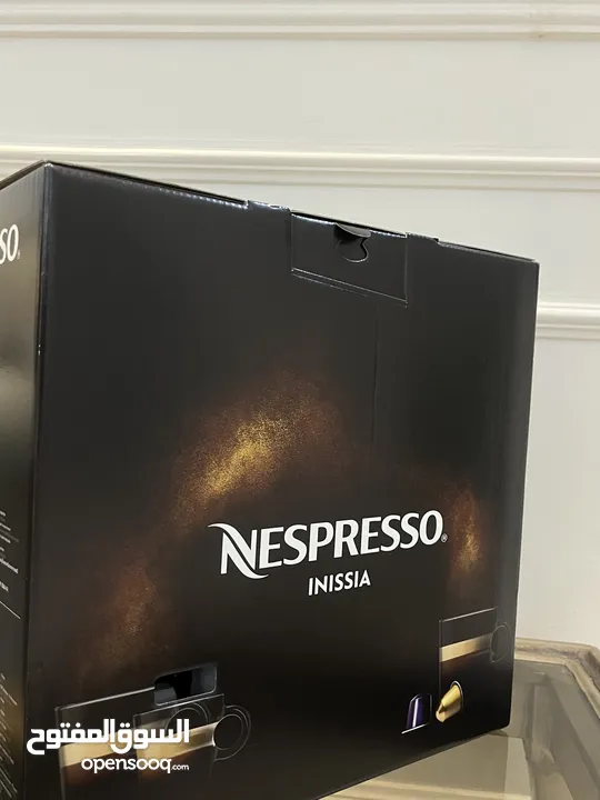 مكينه قهوه من شركه Nespressoجديده و مع ضمان من الشركه