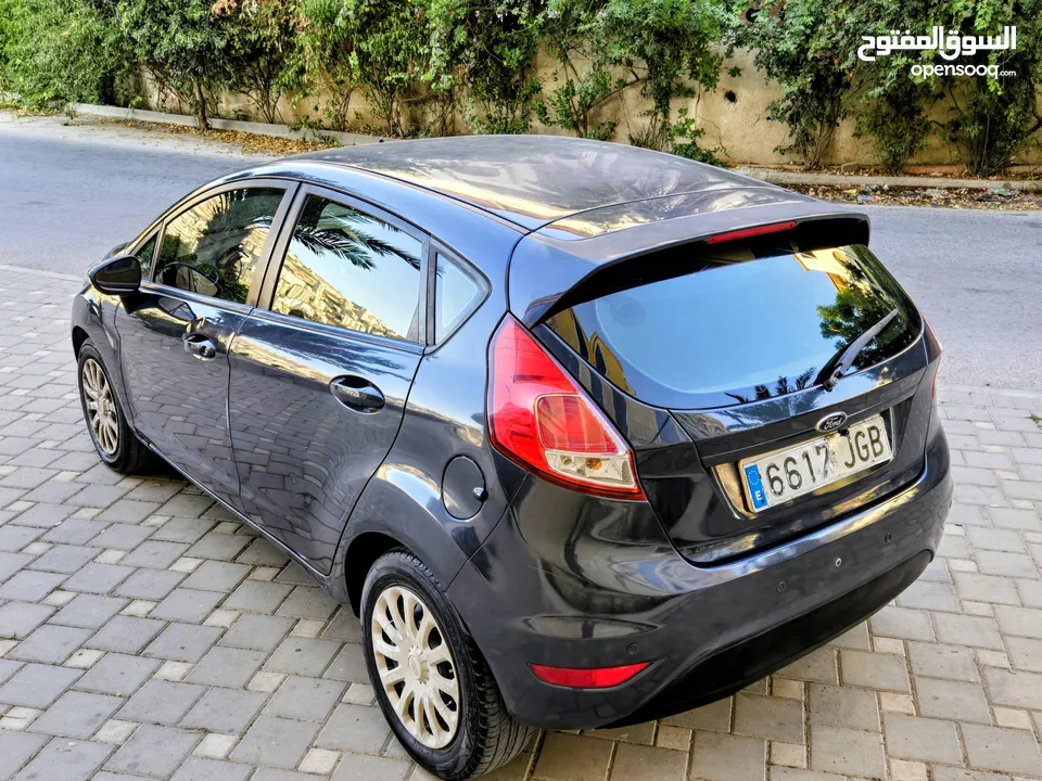 فورد فييستا 2013 بالرخصة مرخصة مأمنة منفوضة نفض كامل جديد وممتاز