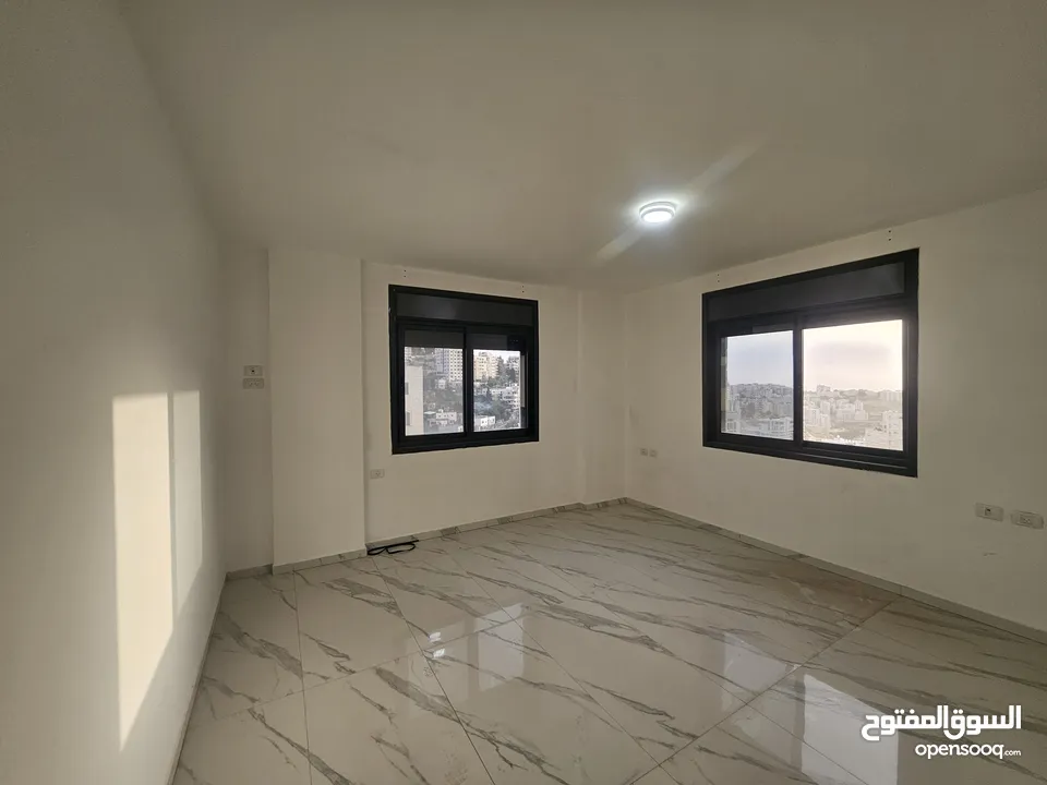 شقة غير مفروش جديدة وسط المدينة