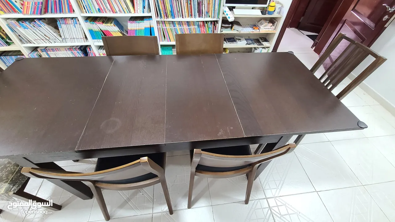 Good quality dining table and 7 chairs
