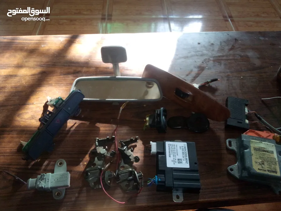قطع سيارات لقمتين ابواب وا كبسة رباعي لمتسوبيشي لانسر  وكمبيوتر مرسيدس  منضم البنزين