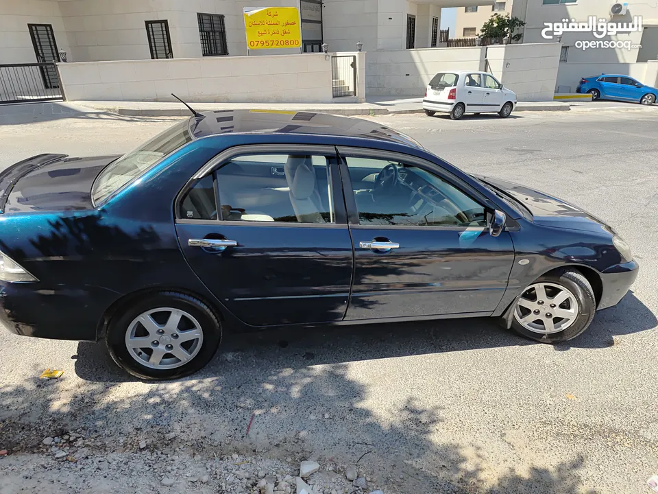 متسوبيشي لانسر GLX 2007 1600 cc وارد الخليج الكويت جميع الإضافات بإستثناء الفتحه وجنط إضافي.